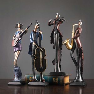 Пештрайские ретро -музыкальные инструменты Статуя современного искусства ремесленные изделия саксофон скрипок виолончелистской гитары украшения для домашнего телевизионного шкафа x0627
