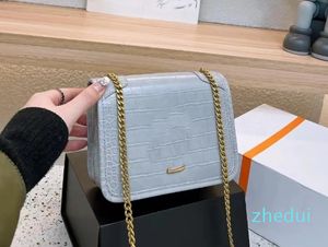 Alışveriş çantası basit tasarımcı moda markası cüzdan cep telefonu çantası ruj çantası buzağı buzağı quanzhen 19cm kızlar satın almalı