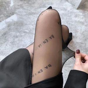 Sexy Long Stockings Tights Women Fashion black and white Thin Lace Mesh Tights Soft Breathable Hollow Letter Tight Panty hose High quality