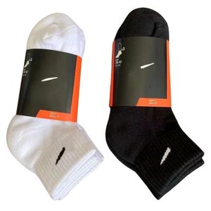 Women's socks men's high-quality cotton solid color socks classic black and white breathable sports socks casual socks luxury all-season socks