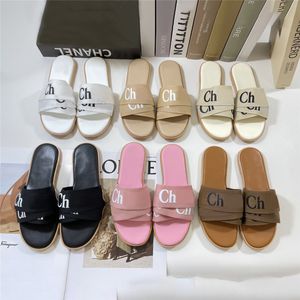 Moda terlik coe 23ss odunsu düz deri slayt sandaletler khaki inci beyaz siyah pembe bej lüksler plaj kadın slaytlar flips flips yaz bayanlar terlik ayakkabı