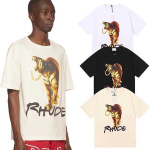 Tasarımcı Moda Giyim Tees Hip hop Tişörtleri Rhude Tiger Tiger Baskılı Erkek Kadın Gevşek Uydurma Yaz Saf Pamuk Popüler Yuvarlak Yaka T-shirt Trendi Streetwear