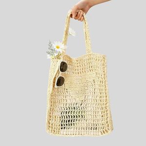 Yüksek kaliteli saman çanta omuz çantası 2023 yeni moda kesim dokuma çanta kadınların el yapımı pamuklu ip net çantası tatil çantası saman çanta kağıt saman dokuma çanta