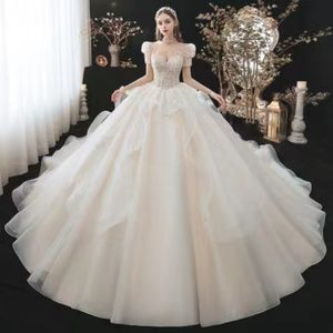 2023 Abito da sposa a trapezio in pizzo taglie forti Illusion in rilievo Applicazioni vintage Grandi abiti da sposa Robe De Mariee Abiti da matrimonio firmati da spiaggia Abiti da sposa 2023