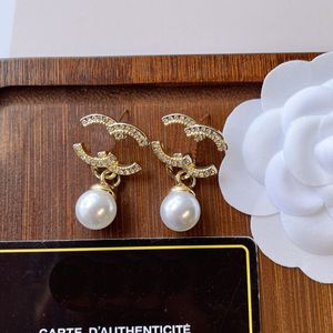 Серьги Женщины Сервинг Серьги с бриллиантами очаг роскошные круглые жемчужины