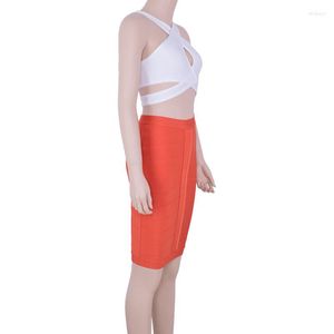 İş elbiseleri 2 adet set örme 2023 seksi kadın beyaz anahtar deliği çapraz mahsul üst turuncu gövde etek