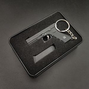 Metallo G17 pistola pistola 1: 3 giocattoli modello con 6 proiettili espulsione guscio sopravvivenza pistola ornamenti in miniatura alta simulazione equipaggiamento soldato staccabile 2112