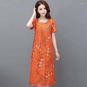 Günlük elbiseler şık ve zarif kadın çiçek elbise yaz 2023 kısa kollu orta yaş kadın gevşek Kore tarzı vintage kıyafetler