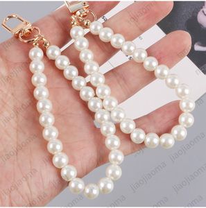 HN Pearl Car Keychain Temperature Simple And Fashionable Girls Small Gift Personalized Couple Bags Luxurys designers Keychain Car Key chain Creative Tripper 50