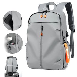 Sırt çantaları moda erkekler sırt çantası yansıtıcı tasarım okul çantası erkekler için modaya uygun kulaklık deliği seyahat çantaları su geçirmez büyük kapasiteli kitap çantaları 231013