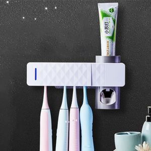 Titulares de escova de dentes Smart Ultravioleta Germicida Caixa de suporte de escova de dentes Limpador de pasta de dentes Dispensador de montagem na parede Acessórios de banheiro 231025