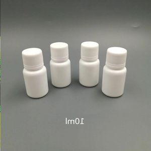 100pcs 10ml 10cc 10g Mühür kapakları ile küçük plastik kaplar hap şişesi, boş beyaz yuvarlak plastik hap ilaç şişeleri lfdse