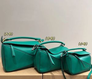 Puuule omuz koltuklu çanta geometrik çanta basit 10a tasarımcı çantası moda marka cüzdan cüzdan cep telefonu çanta ruj çanta boyutu büyük, orta ve küçük kızlar satın almalı 29cm