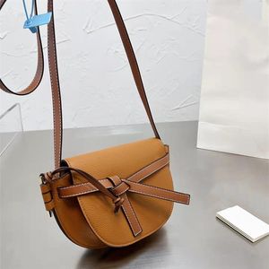 Kadınlar kabuk omuz çantaları tasarımcı yay saddles cüzdan moda bulmaca crossbody tote çanta bayan sevimli akşam küçük kabuk çantası325q