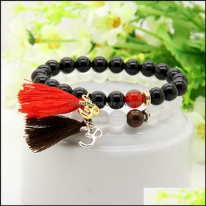 Charm Bilezikler Tasarımı Toptan 8mm Siyah Onyx Taş Beyaz Mat Boncuklar Kırmızı Tassel Stretch Yoga Om Çift Çift Sevgiline Bilezik Deliği DHDEC