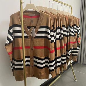 2024 Woolen Knitted Cardigan Women's V-neck Mid length Coat Stripe Button Art Sweater Simple Versatile Luxury Women's Dress