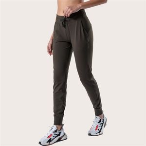 LL-2079 Pantolon Kadın Pantolonları Yoga Gevşek Dokuzuncu Pantolon Tepki Spor Spor Salonu Çalışan Günlük Uzun Ayak Bileği Bantlı Pantolon Elastik Yüksek Bel Drawstring