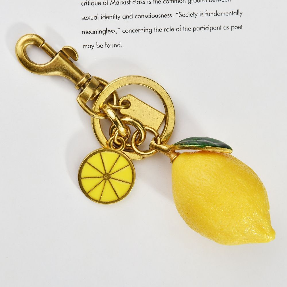 Hot Selling Charm New Creative Resin Simulation Fruit Lemon Car Bag Pendant Couple Keychain Gift Free Shipping_voghion.com