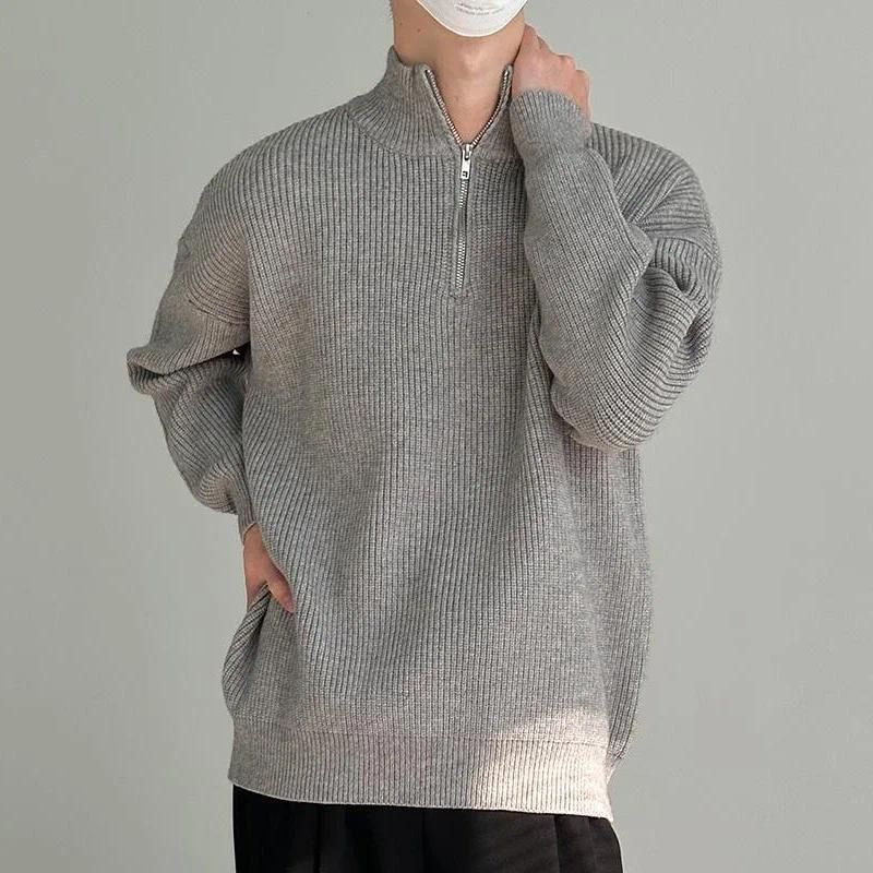 grauer Pullover