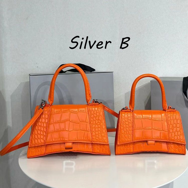 Orange-Croc-Silver logo