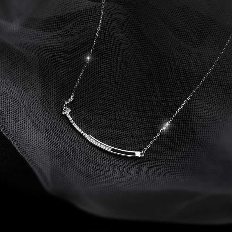 Glimlach ketting in platina