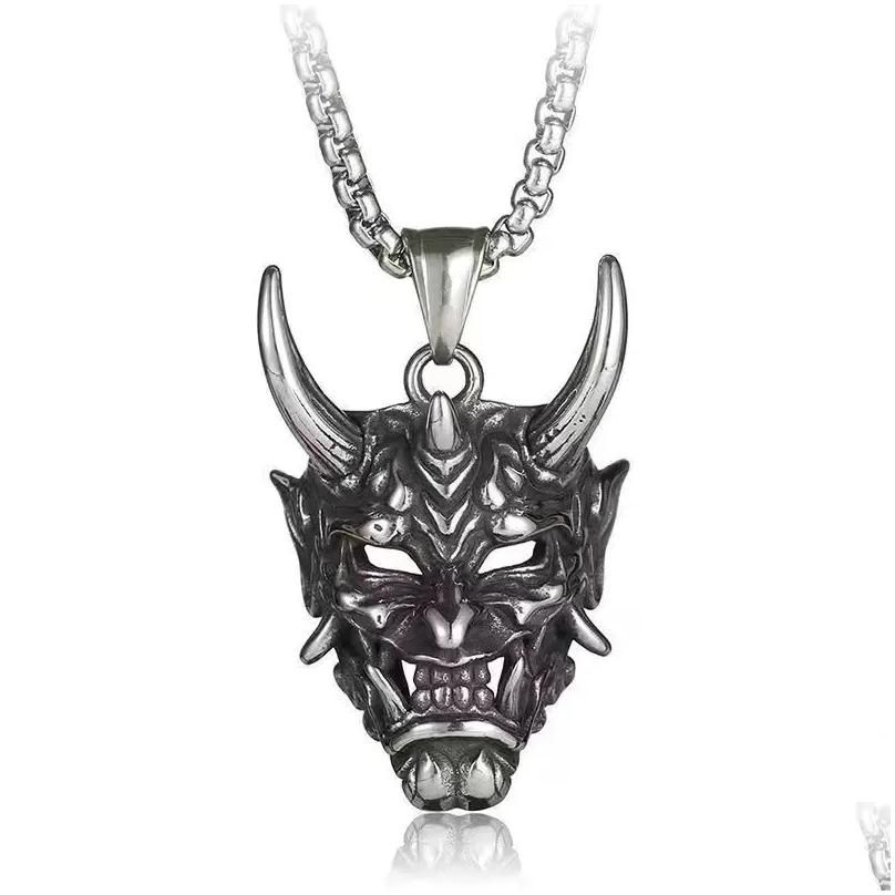 Silver Mask Necklace