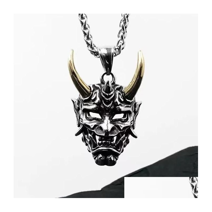 Gold Mask Necklace