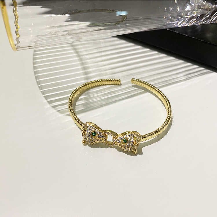 Bracciale a doppia testa leopardo in vero oro