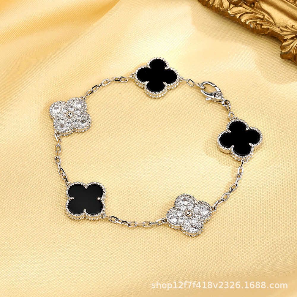 Bracelet coquillage noir en argent plein de diamants