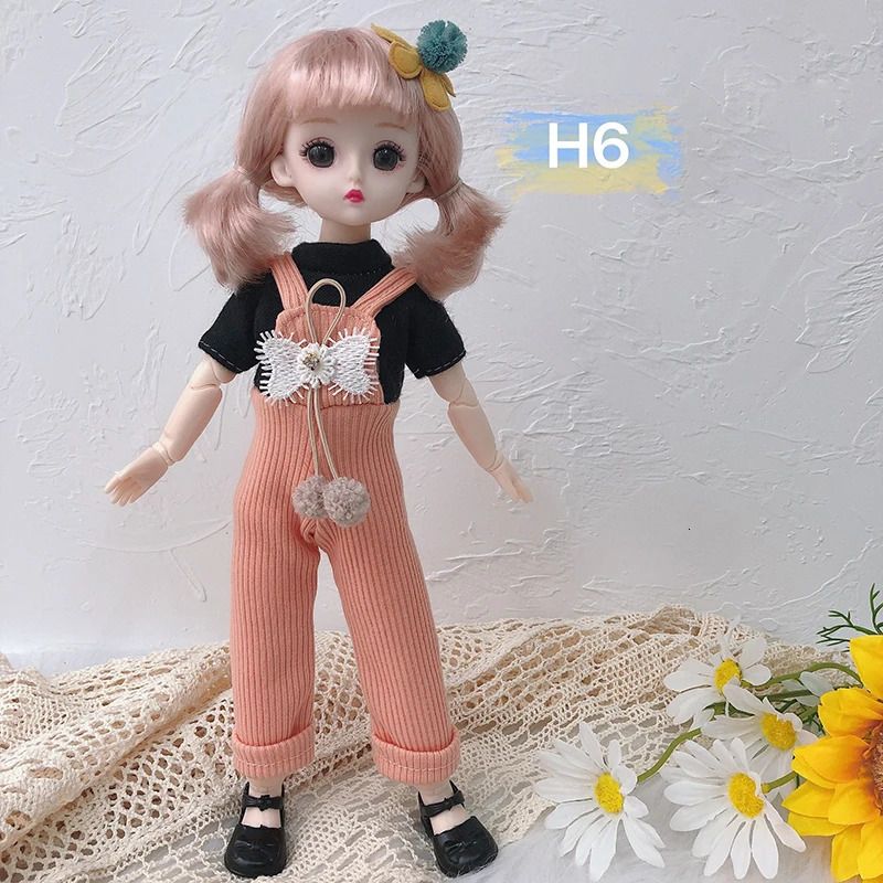 H6-docka och kläder