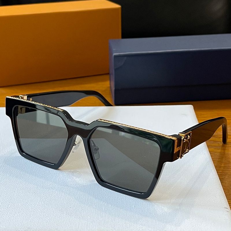 black golden frame with black lens