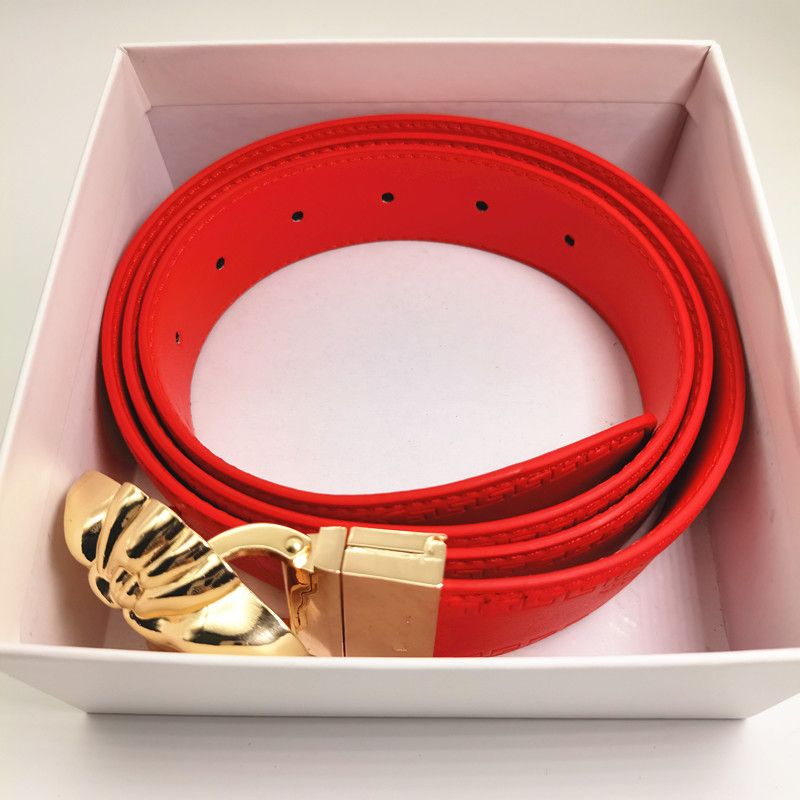 Red belt + gold buckle