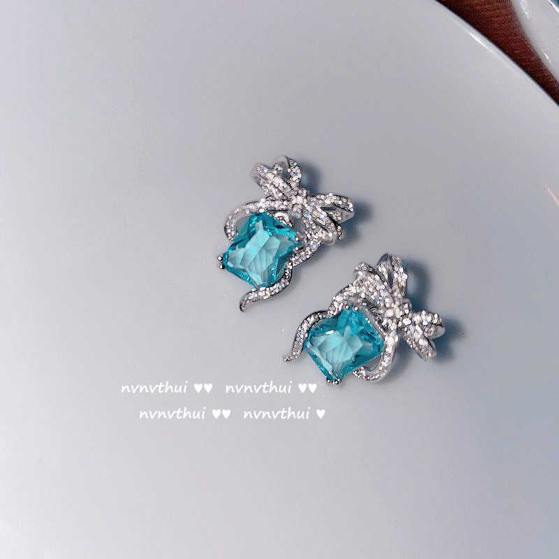 a Pair of Sea Blue Zircon Bow Earrings