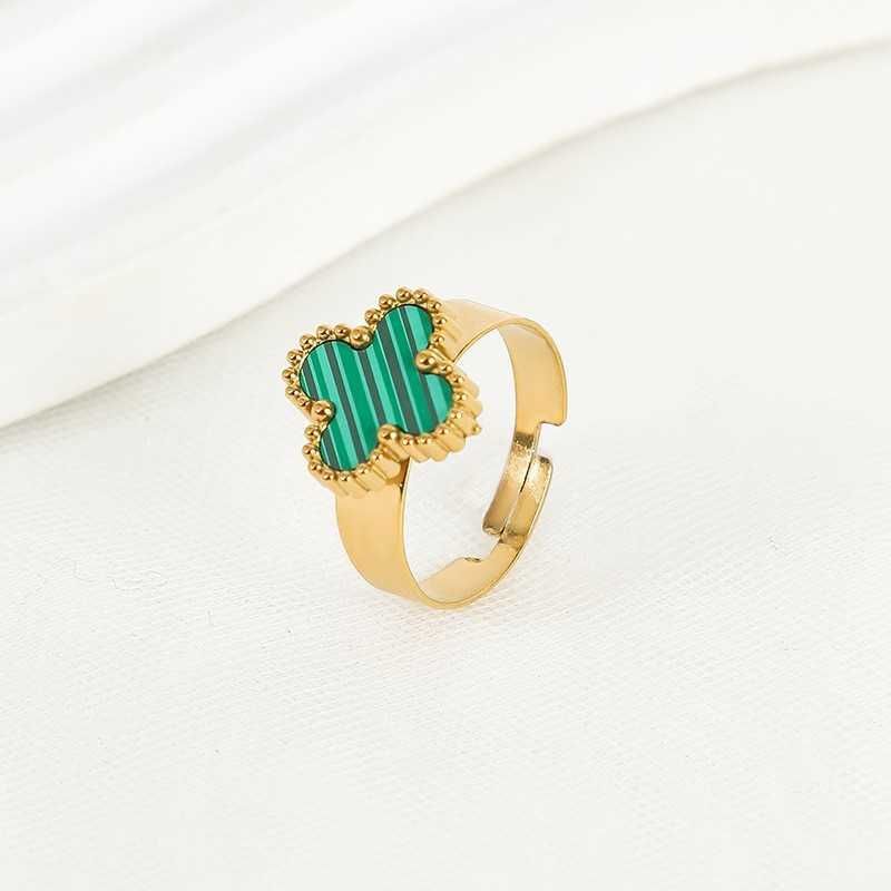Золотое зеленое кольцо с четырьмя листьями травы