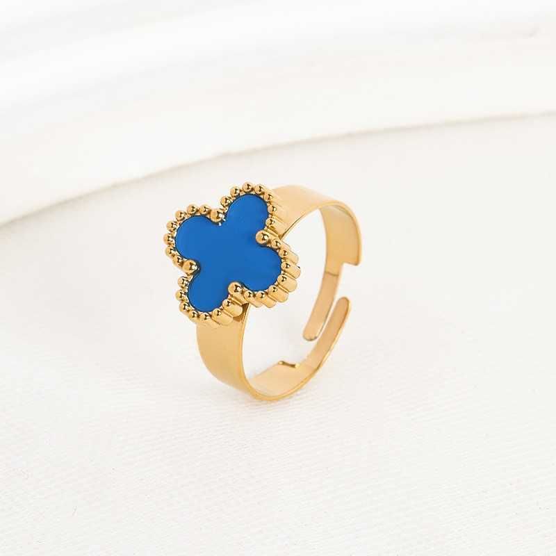 Золотое синее кольцо с четырьмя листьями травы