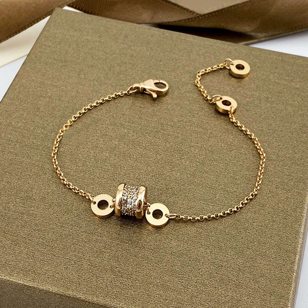 Dorado champagne. Pulsera de cintura pequeña H