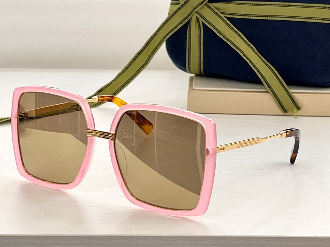 Pink frame gold mirror lens