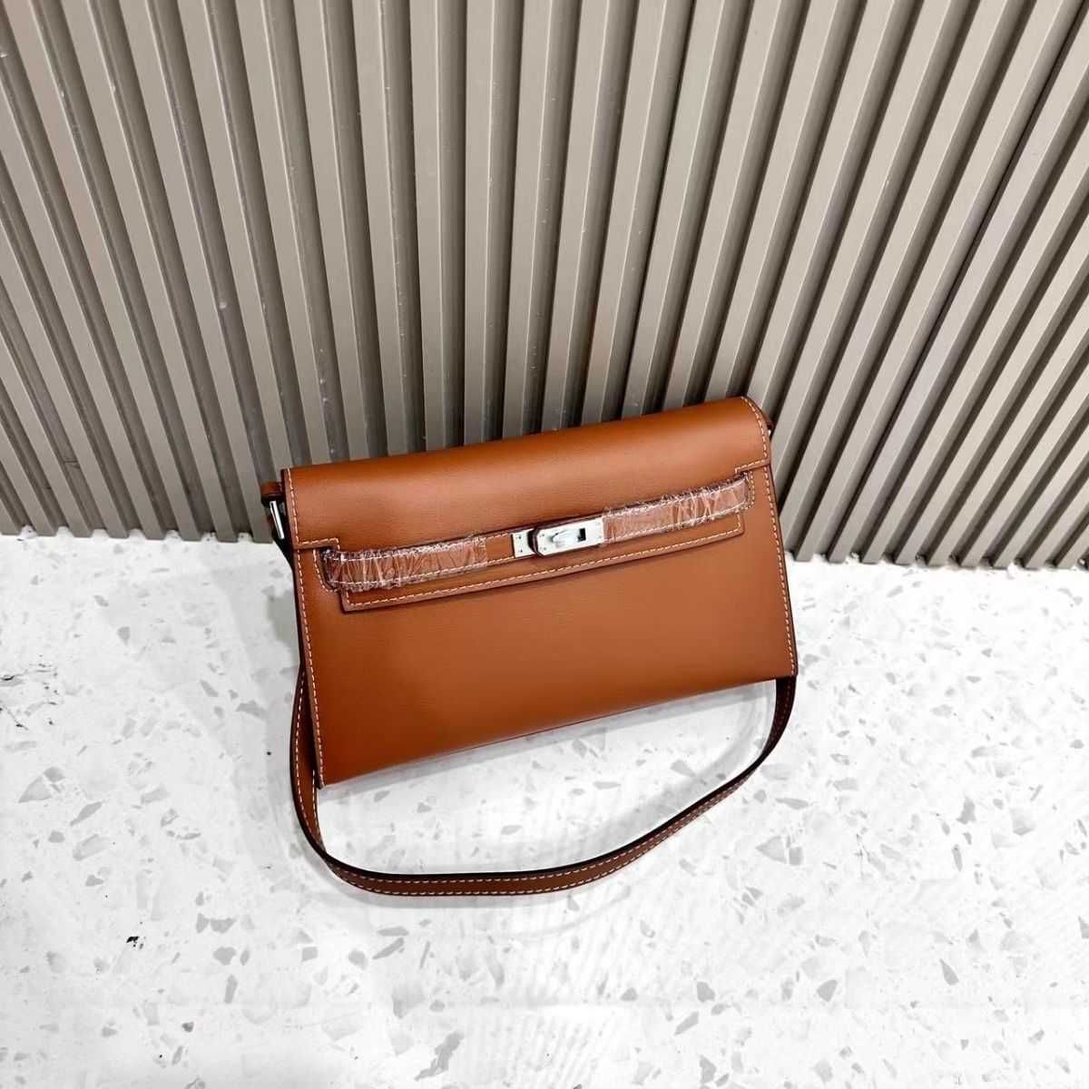 caramel brown swift leather silver