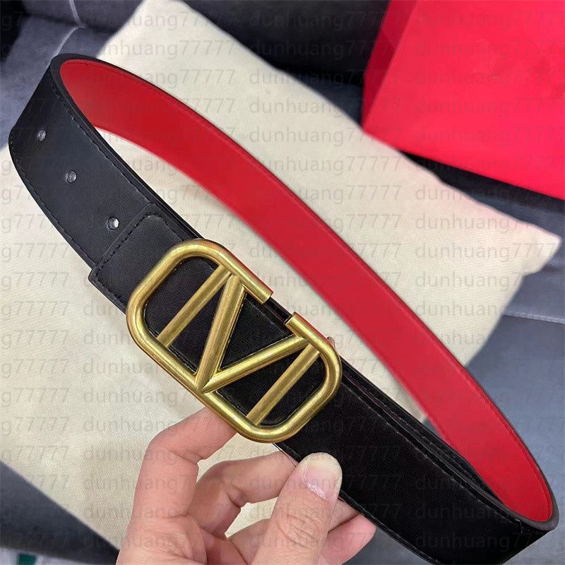 Gold buckle black belt