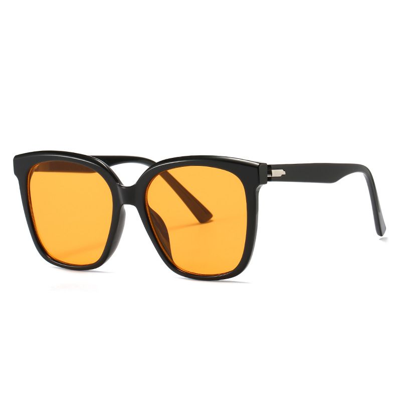 Black framed orange lenses