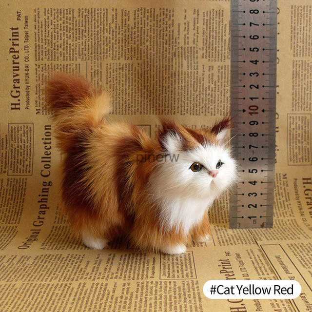 gatto giallo rosso