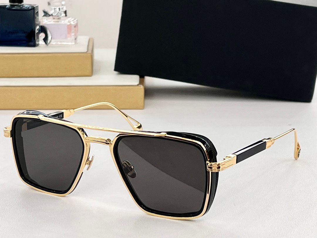 gold black frame grey lenses