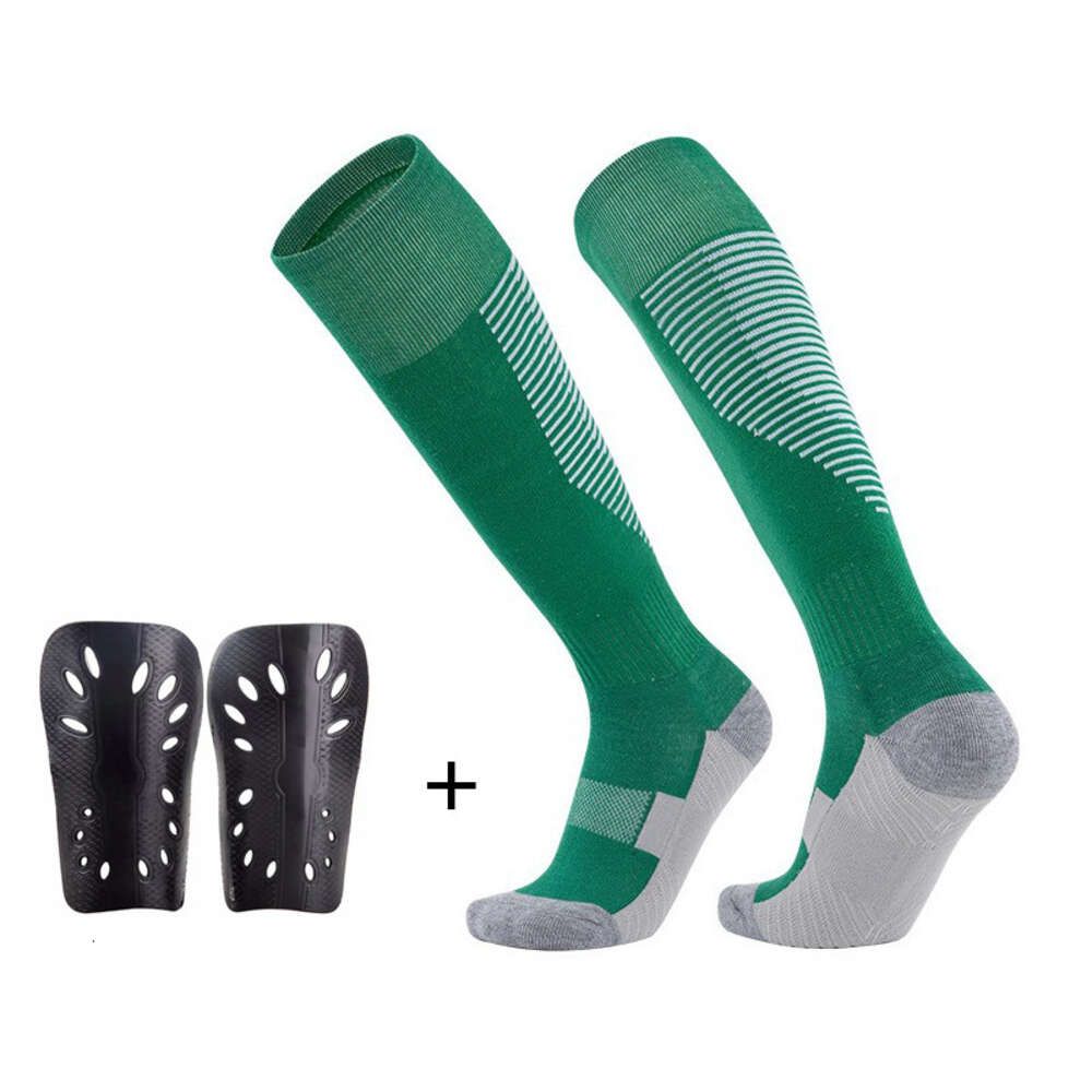 Grasgroene sokken+beenbeschermers