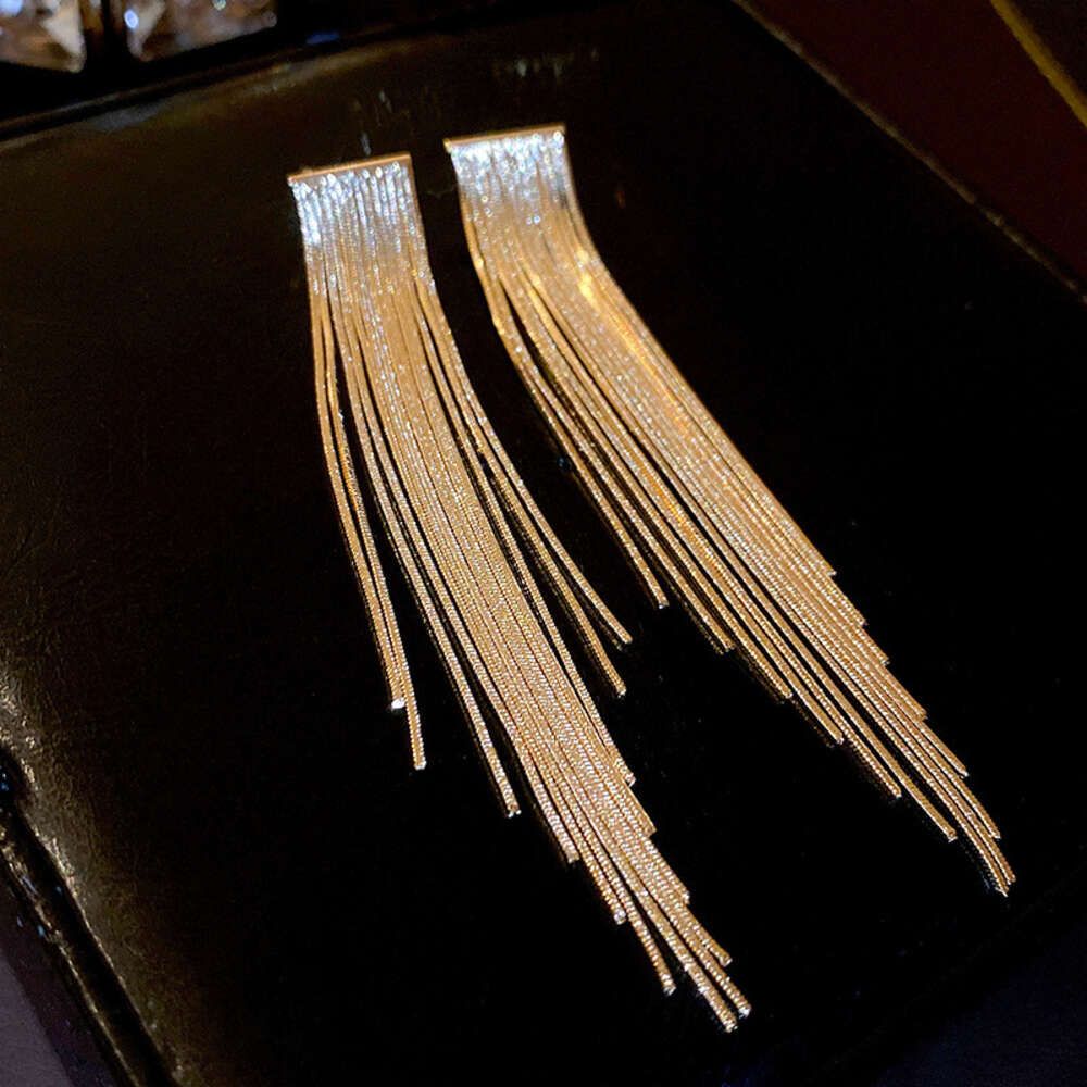 32 # Silver Needle Golden Tassel Real