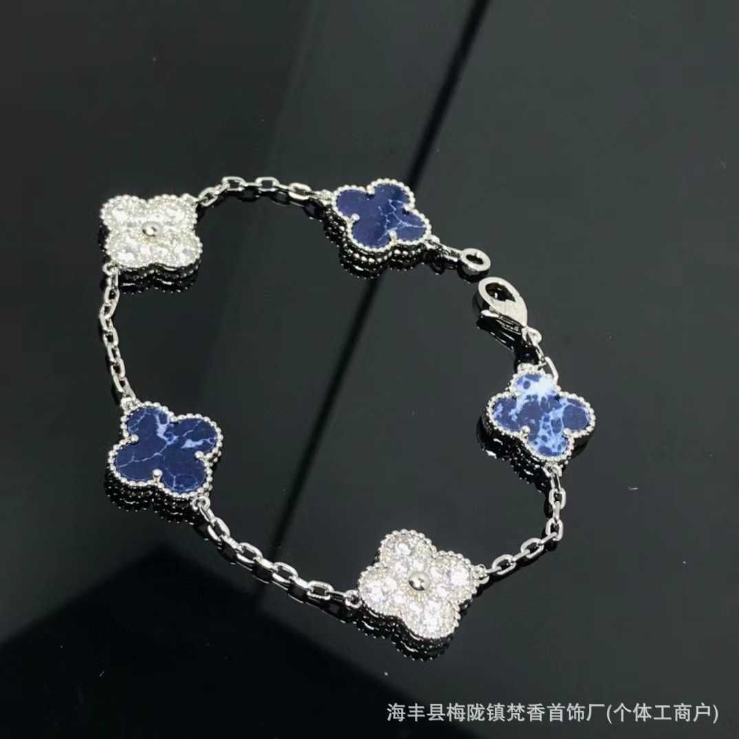 Bracciale Peter Stone con cinque fiori e diamanti