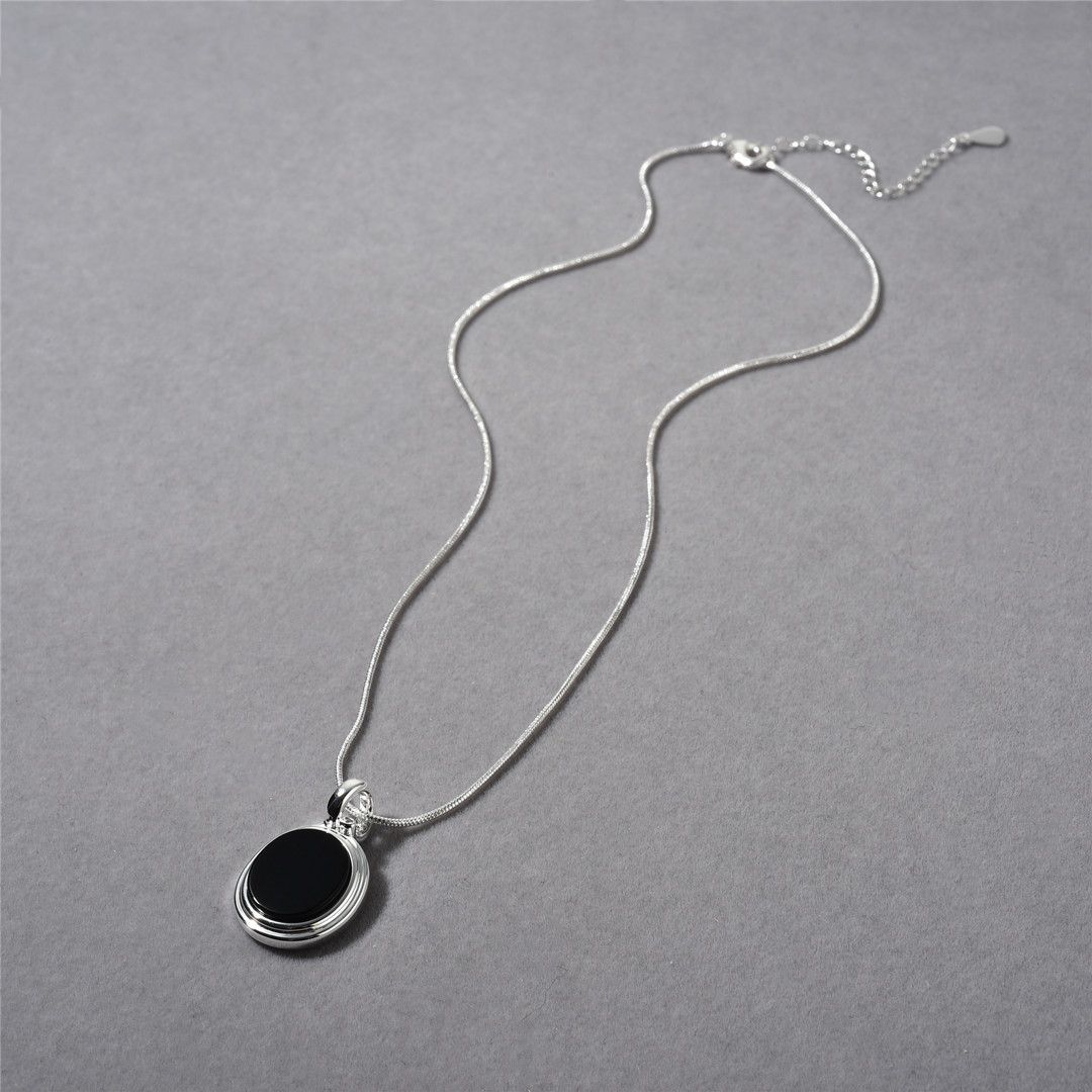 A black agate pendant necklace