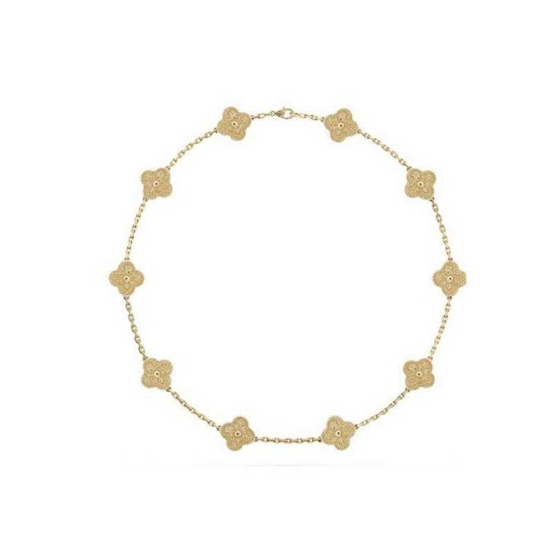 Colar dourado cheio de diamantes com dez flores