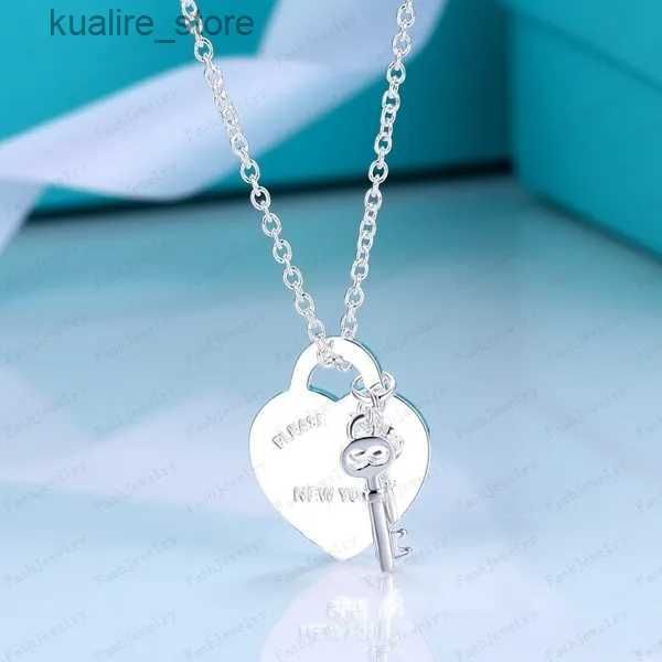 Small Platinum Colored Key Necklace