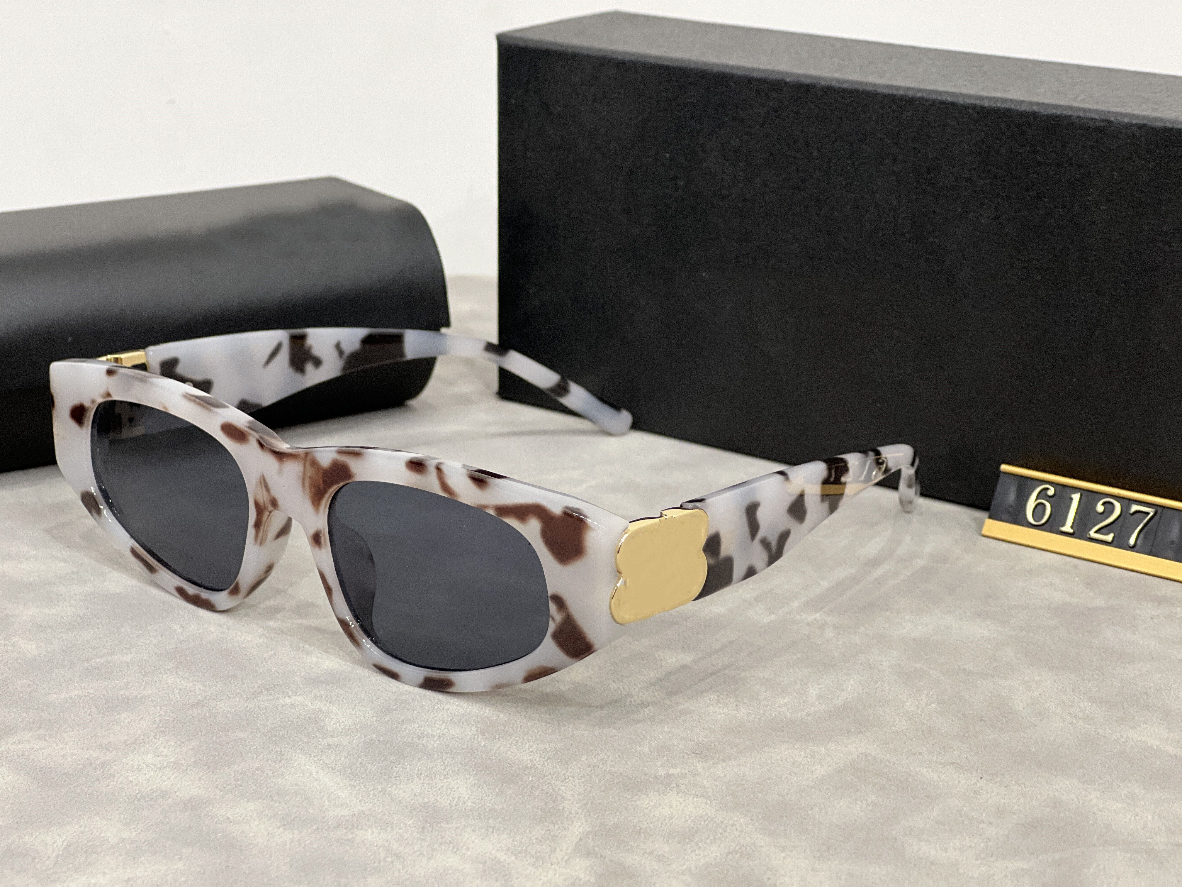 White leopard print frame grey lens