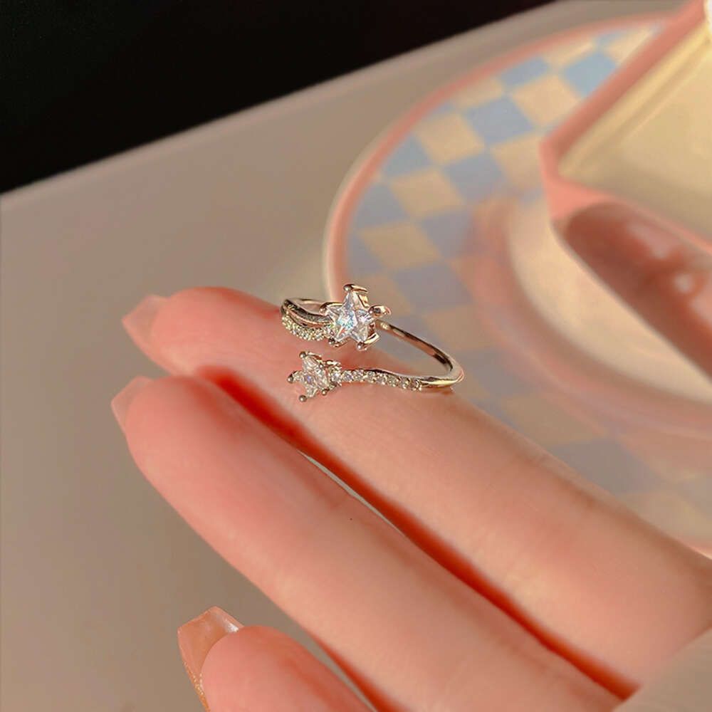 J675 Silver Copper Star Zircon Ring